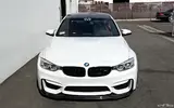 Alpine-White-BMW-F82-M4-With-Vorsteiner-Carbon-Fiber-Aero-Parts-2.webp