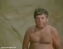 GIF-SuperFantozzi-con-Lingua-di-Fuori-Scena-Creazione-DellUomo-e-di-Fantozzi-Film-del-1986.gif